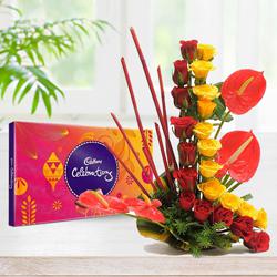 Beautiful Roses with Anthurium Arrangement with Cadbury Celebration to Punalur