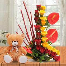 Lovely Anthodium N Roses Arrangement with Cute Teddy to Alwaye