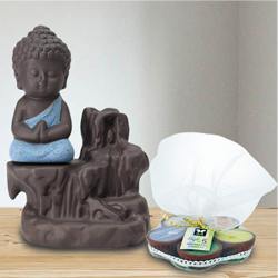 Pious Meditating Monk Buddha N Incense Holder with Iris Aroma Candles to Chandigarh