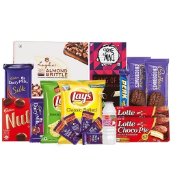 Happiness Loaded Crunchies N Munchies Cone Hamper to Punalur
