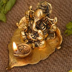 Marvelous Ganesha on Leaf with Diya to Andaman and Nicobar Islands