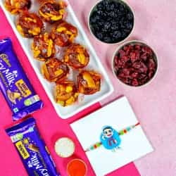 Quirky Modi Rakhi with Sweet N Dry Fruits Combo to India