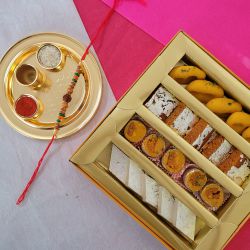 Charming Rudraksha Rakhi with Sweets  N  Golden Rakhi Thali Combo