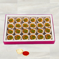 Kaju Pista Premium Sweets from Haldiram with free Roli Tilak and Chawal.