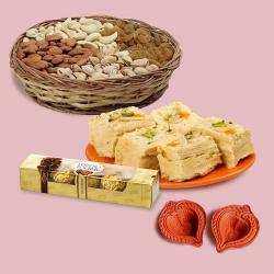 Ambrosial Gift of Dry Fruits, Soan Papdi with Rocher n Diya Pair to Stateusa_di.asp