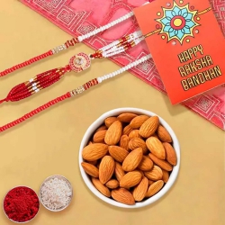 Charming Set of 3 Rakhis with Crunchy Almonds, Roli Tika n Card to Rakhi-to-usa.asp