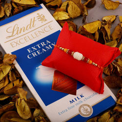 Delightful Gift of Lindt Milk Chocolate with Rakhi to Usa-gifts-for-sister.asp