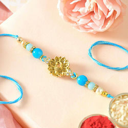 Bless More with Peacock Rakhi to India