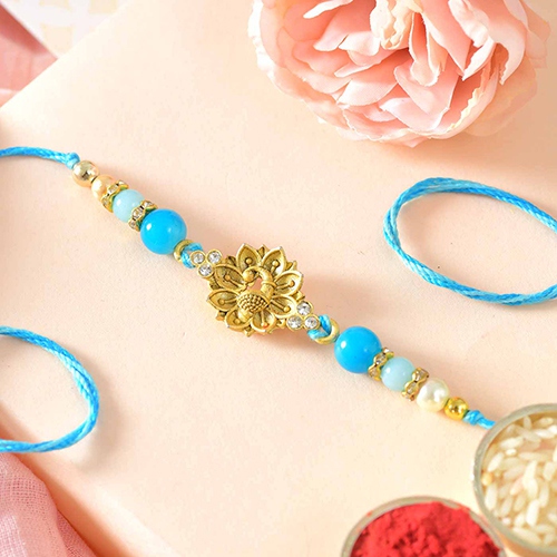 Bless More with Peacock Rakhi to Gurgaon