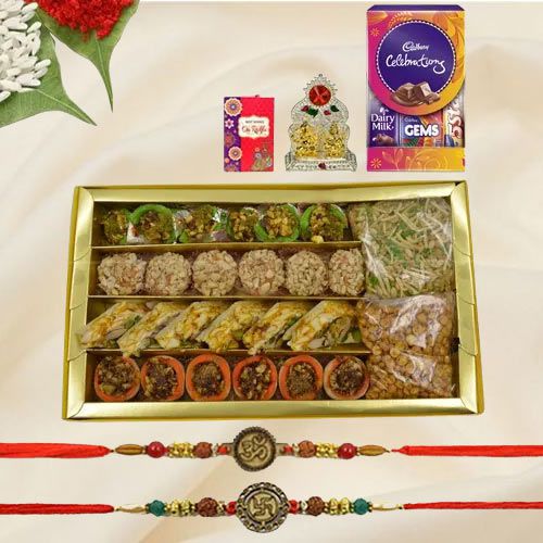 Auspicious Rakhi with Savoury Sweets to Rakhi-to-world-wide.asp