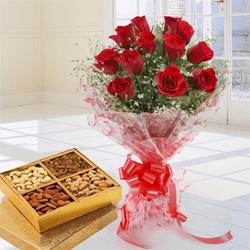 Stunning 12 Red Roses added with nutritious Dry Fruits to India