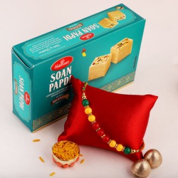 Delightful Combo of Rakhi, Roli Tika N Rakhi Card with Soan Papdi to Australia-rakhi-sweets.asp