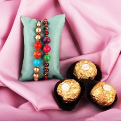 Classic Gift of 2 Rakhis, Ferrero Rocher, Roli Tika and Card to Australia-rakhi-chocolates.asp