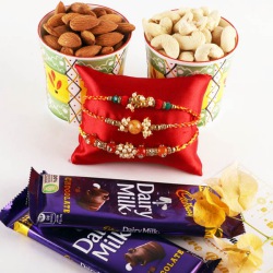 Ravishing Set of 3 Rakhis, Mixed Dry Fruits N Cadbury Chocolate to Rakhi-to-australia.asp