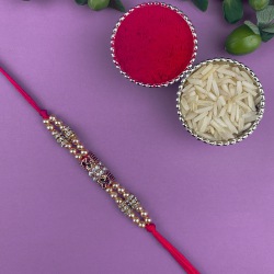 Sassy Diamond Rakhi and Beads Charm to Rakhi-to-canada.asp