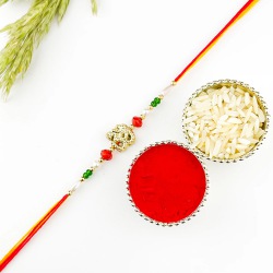 Ebullient Golden Halo Om Rakhi to Rakhi-to-canada.asp