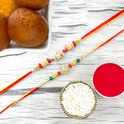 2 Antique Charm Rakhis with Groovy Gulabjamun to Canada-rakhi-sweets.asp