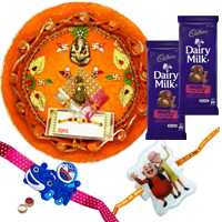 Ultimate Combo of Kid Rakhi , Rakhi Thali with Cadbury Dairy Milk Chocolate Fruit & Nut. to Rakhi-to-canada.asp