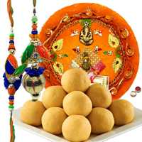 Graceful Set Of Bhaiya Bhabhi Rakhi, Pooja Thali And Luscious Besan Laddoo to Rakhi-to-canada.asp