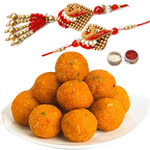 Modish Bhaiya Bhabhi Rakhi Set Along With Scrumptious Bundi Laddoo to Rakhi-to-canada.asp