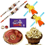 Spellbind Combo Of Bhaiya Rakhi, Kids Rakhi, Cashew, Fruits N Nut Cadbury Dairy Milk And Pooja Thali to Rakhi-to-canada.asp