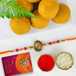 Festive Kundan Rakhi with Sweet Besan Ladoo to Rakhi-to-canada.asp
