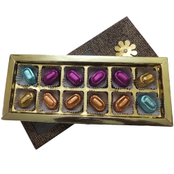 Delicious Box of 12 pcs Assorted Homemade Chocolate. to Hariyana