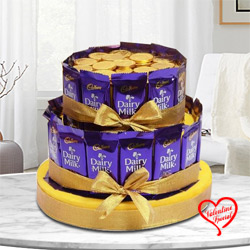 Lavish Tower Arrangement of Cadbury Dairy Milk with Gold Coin Chocolates