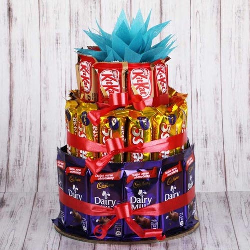 Enticing 3 tier Arrangement of Assorted Chocolates to Alwaye