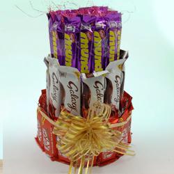 Tempting 3 Layer Tower Arrangement of Mixed Chocolates to Nipani
