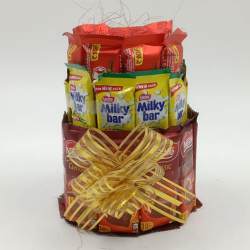 Ambrosial 3 Layer Tower Arrangement of Nestle Chocolates to Alwaye