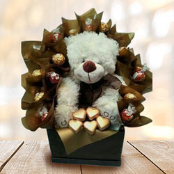 Marvelous Teddy with Handmade Chocolates Arrangement to Marmagao