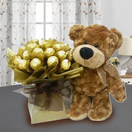 Marvelous Brown Teddy with Ferrero Rocher Chocolat... to Alwaye