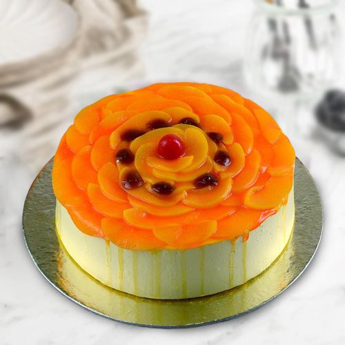 Delicate Eggless Mango Delight Cake to Alwaye