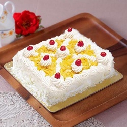 Delicious Eggless Pineapple Cake to Perintalmanna