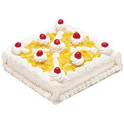 Enticing Eggless Pineapple Cake to Marmagao
