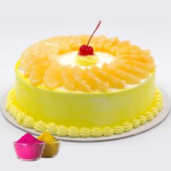 Fresh Baked Egg less Pineapple Cake Filled with Soft Creams from top bakery in the city with free Gulal/Abir Pouch.
.
