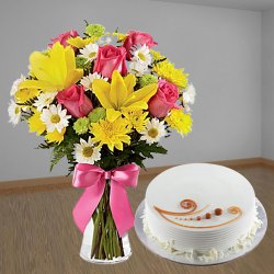 Yummy Combo of Vanilla Cake with Twelve Mixed Flowers Hand Bunch