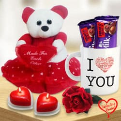 Valentines Day Combo of Teddy with Heart, Cadbury Chocolates, Heart Shape Candle n a Love Mug to India