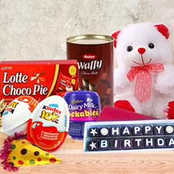 Delicate Chocolate Gift Pack with Birthday Essentials to Chittaurgarh