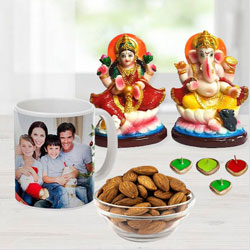 Prosperous Ganesh Laxmi Idol with Personalized Coffee Mug, Cadbury Chocolates n Almonds, Free Wax Diya