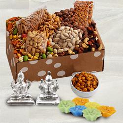 Unique Gift Box of Dried Fruits n Gourmet, Silver Plated Ganesh Lakshmi Idol  N  Wax Diya to Marmagao