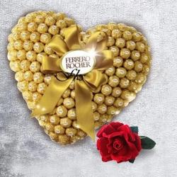 Charismatic Chocolate Day Gift of Heart Arrangement of Ferrero Rocher with Rose