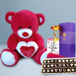 Charming Valentine Gift of Red Teddy with I Love You Chocolate N Golden Rose