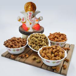 Yummy Assortment of Flavored Cashews with Lord Ganesh Idol