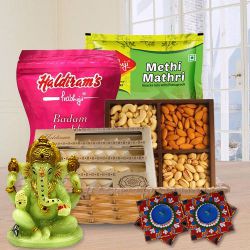 Unique Diwali Gift Hamper of Dry Fruits, Haldriam Sweets, Ganesh Idol  N  Dot Mandala Art Diya to Punalur