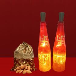 Ideal Gift of Subh Labh LED Bottle Lamp n Almonds Potli to Kollam