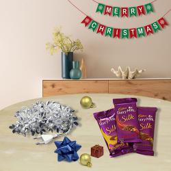 Excellent String Lights n Merry Christmas Banner with Cadbury Chocolates to Marmagao