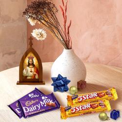 Stunning Xmas Gift of Holy Statue, Pendant n Chocolates to Nipani