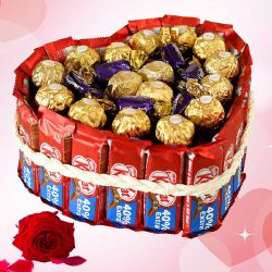Delectable Ferrero Rocher, Kitkat n Cadbury Choclairs Heart Shape Bouquet